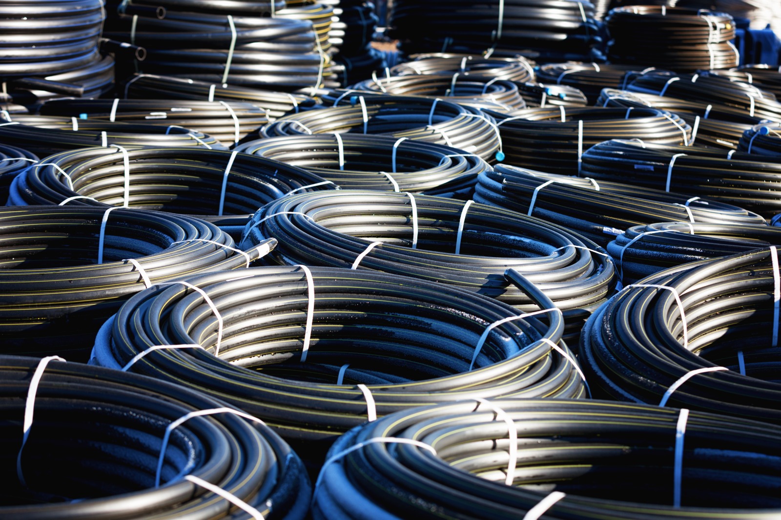 Cosmetic beauty products on blue background. Bottles and tubes with branding mock up